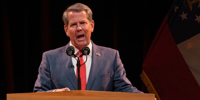 Republican Gov. Brian Kemp addresses supporters at a watch party after winning re-election on election night on Nov. 8, 2022, in Atlanta.