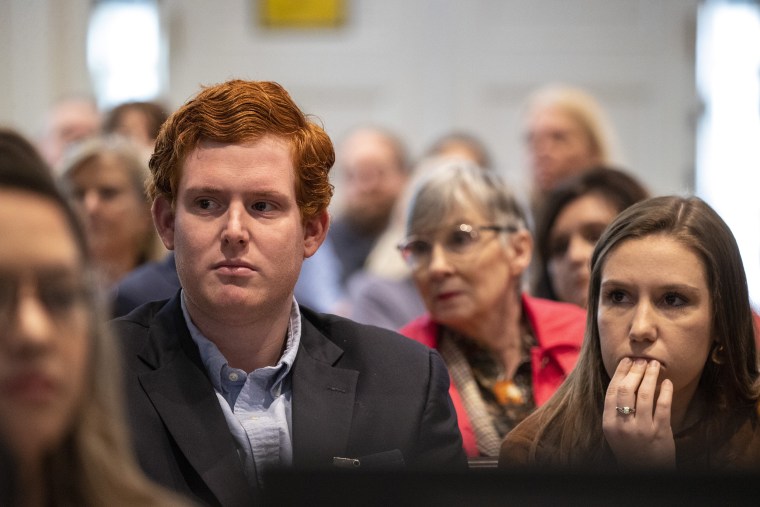 Buster Murdaugh and his girlfriend Brooklynn White watch a video clip from Buster's brother Paul's phone in the double murder trial of Alex Murdaugh at the Colleton County Courthouse in Walterboro, S.C.,