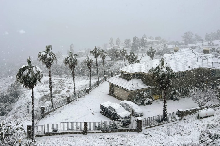 Snow blankets a home in Rancho Cucamonga, Calif., on February 25, 2023. 