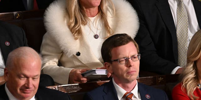 Greene is pictured yelling at President Biden during the address.