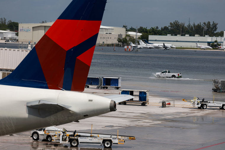 Planes sit at their gates after the Fort Lauderdale-Hollywood International Airport was closed due to flooding on April 13, 2023.