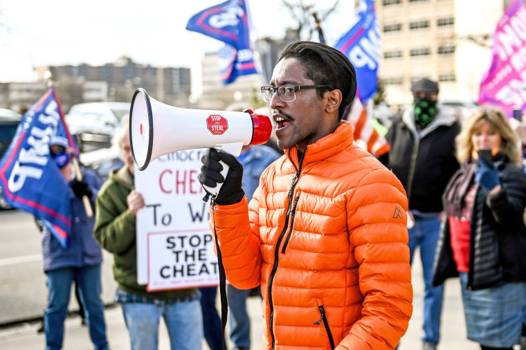 Ali Alexander speaks during a Secretary of State building