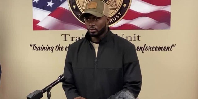 Reginald Robertson is pictured at a press conference surrounding Tiffany Foster's disappearance in 2021