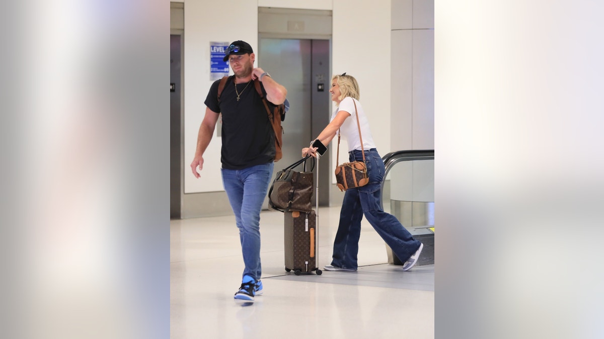 Robert Shiver and Savannah Chrisley at LAX.