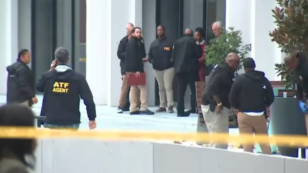 Officials outside of Atlanta building