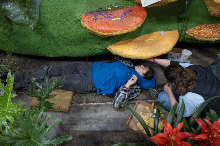 Final touches put on Rose Parade floats at Rosemont Pavilion in Pasadena