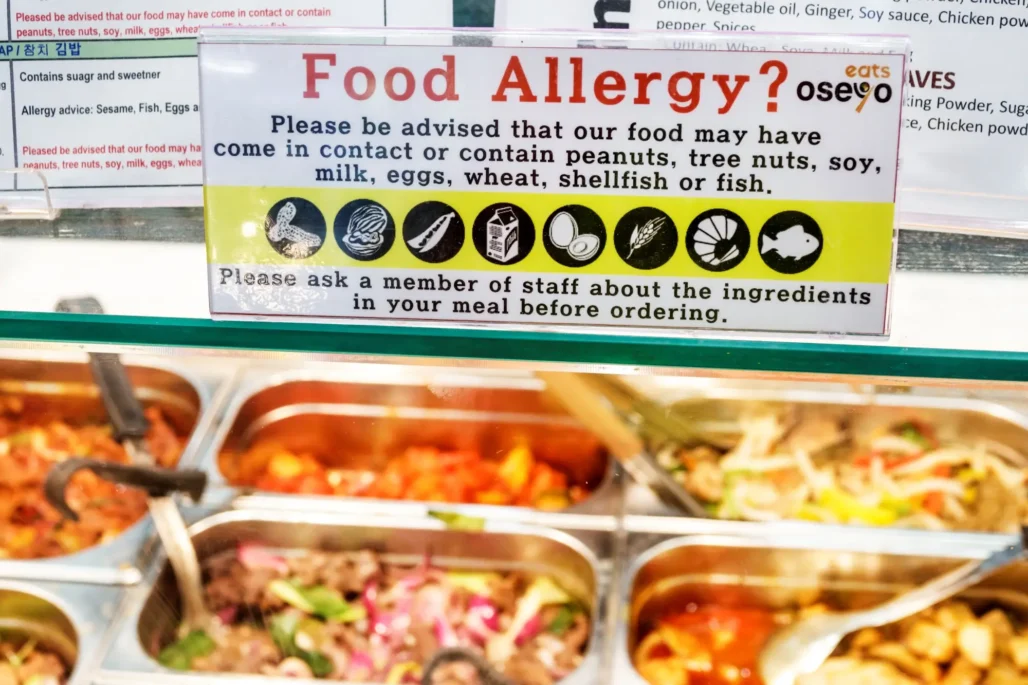 Food allergy warning sign at restaurant